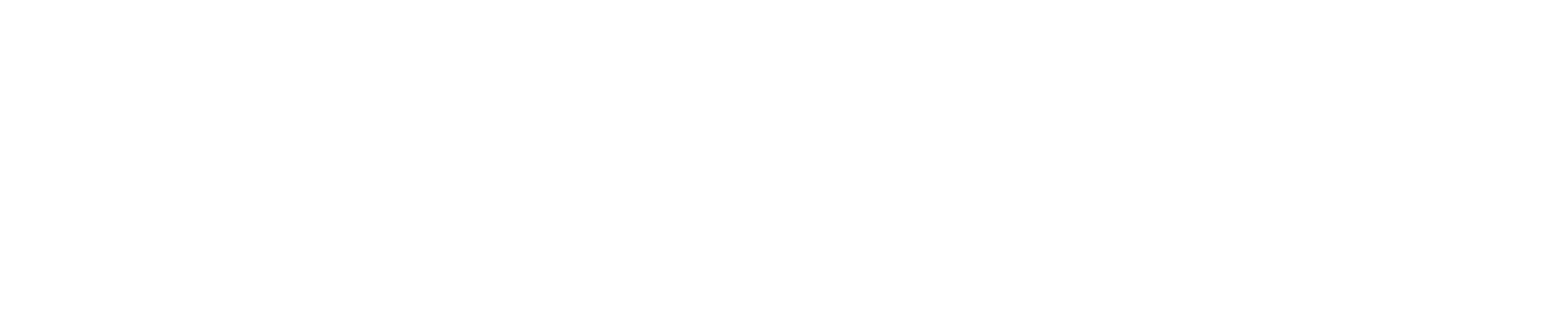 Property entrance sign with landscaping at The Hamilton Apartments, Miami, Florida